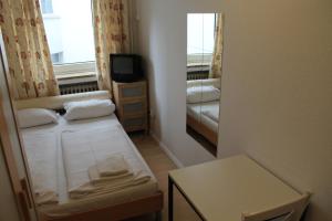 Postel nebo postele na pokoji v ubytování Hotel Lilienhof