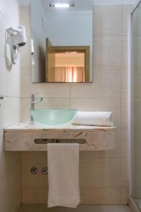 Koupelna v ubytování Sol Hotel + 30 fotografií