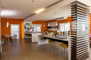 Virtuvė arba virtuvėlė apgyvendinimo įstaigoje VOA Business Supreme Choice Confins