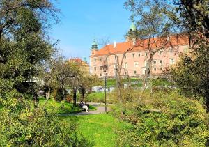 Zahrada ubytování Mieszkanko koło Zamku