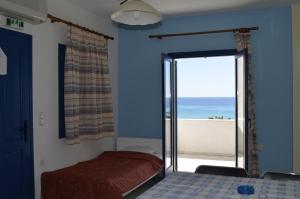 Posteľ alebo postele v izbe v ubytovaní Akti Rooms