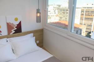 Łóżko lub łóżka w pokoju w obiekcie New deluxe studio 3 downtown Thessaloniki - Fully equiped