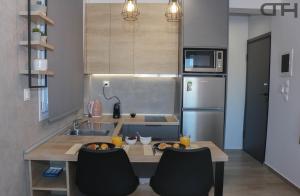 Kuchnia lub aneks kuchenny w obiekcie New deluxe studio 3 downtown Thessaloniki - Fully equiped