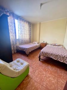 Cama o camas de una habitación en Hospedaje Anais