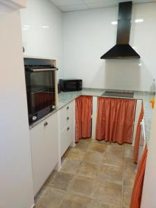 Kuchyň nebo kuchyňský kout v ubytování PALACIO Boutique + 37 fotografií
