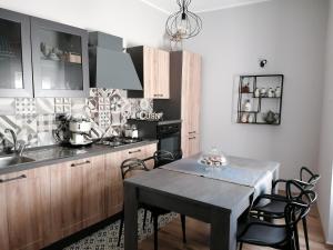 Kuchyň nebo kuchyňský kout v ubytování B&B Curtopassi