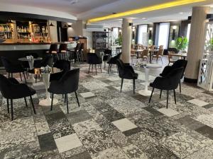 Reštaurácia alebo iné gastronomické zariadenie v ubytovaní Arena Hotel Spa & Wellness