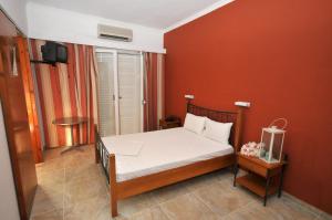 Postel nebo postele na pokoji v ubytování Hotel Galaxy