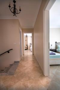 A bed or beds in a room at Villa Etki