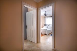 A bed or beds in a room at Villa Etki
