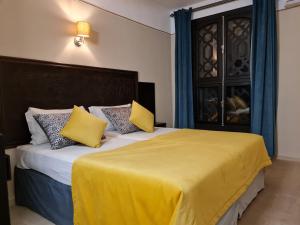 Postel nebo postele na pokoji v ubytování Hotel Batha