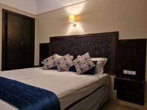 Postel nebo postele na pokoji v ubytování Hotel Batha