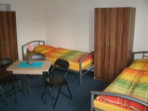 Krevet ili kreveti u jedinici u objektu "Gästehaus Vienenburg" -Monteurzimmervermietung-