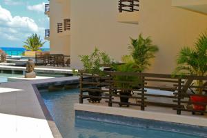 The swimming pool at or close to Aldea Beachside Condo by BVR
