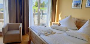 Ένα ή περισσότερα κρεβάτια σε δωμάτιο στο Haus Vier +40 φωτογραφίες