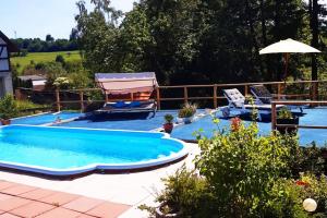 Bazén v ubytování Work & Stay Apartment nebo v jeho okolí