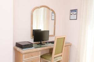 TV a/nebo společenská místnost v ubytování Hotel Terme Saint Raphael
