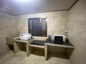 Cucina o angolo cottura di Baan Khue Wieng Resort