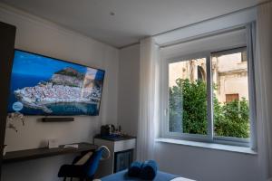 Photo de la galerie de l'établissement BM SUITES CEFALU, à Cefalù