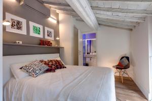 Cama o camas de una habitación en Mamo Florence - St Elizabeth Loft Apartments