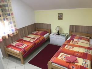 Кровать или кровати в номере Guesthouse Rebel