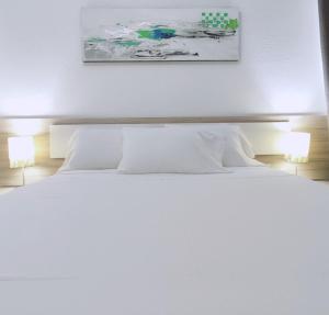 Postel nebo postele na pokoji v ubytování Bonito Apartamento en Parque Santiago 2