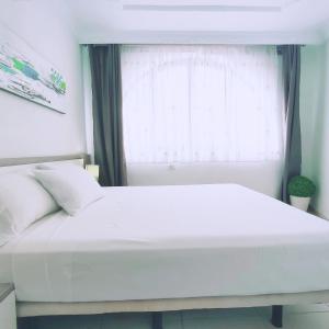 Postel nebo postele na pokoji v ubytování Bonito Apartamento en Parque Santiago 2
