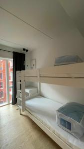 ApartmentInCopenhagen Apartment 1463 tesisinde bir ranza yatağı veya ranza yatakları
