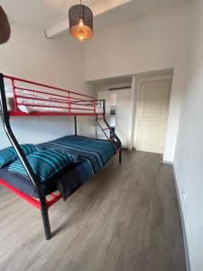 Postel nebo postele na pokoji v ubytování Résidence Les Vignerons