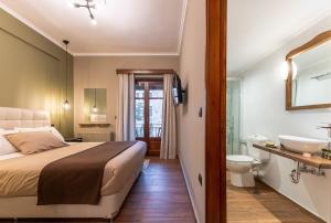 Koupelna v ubytování Ef Zin Hotel Arachova + 37 fotografií