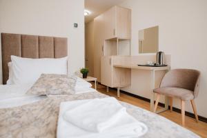 Postel nebo postele na pokoji v ubytování ОРАНТА