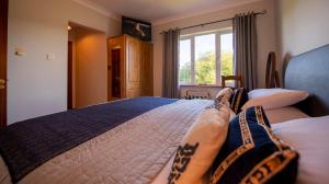 Letto o letti in una camera di Bunratty Meadows Bed & Breakfast