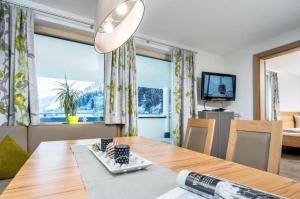 Televízia a/alebo spoločenská miestnosť v ubytovaní Haus Sabrina Kreuzjoch