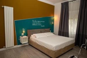 Katil atau katil-katil dalam bilik di L'Archè Comfort&Relax, Sweet Home via Eraclito