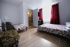 Postel nebo postele na pokoji v ubytování Villa Elena