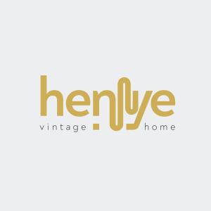 a logo for a mortgage home at Henye Vintage Home a Káli-medencében in Balatonhenye