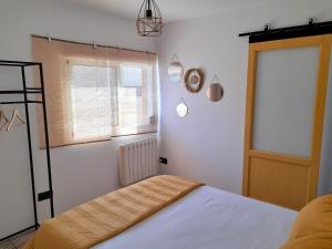 Кровать или кровати в номере La CaSita