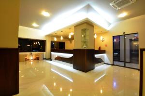Postel nebo postele na pokoji v ubytování Hotel Fontana