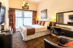 TV a/nebo společenská místnost v ubytování Fox & Hound Hotel