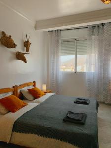 Tempat tidur dalam kamar di Casa Lucía