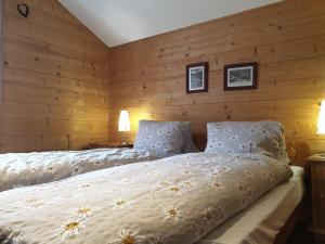 Postel nebo postele na pokoji v ubytování Chalet Samson