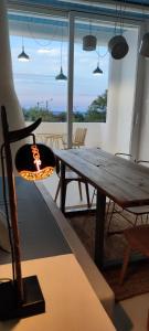 a wood fired pizza oven in a room with a table at Casa Mediterranea Jacuzzi riscaldata con Caminetto in Specchiolla