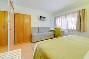 Postel nebo postele na pokoji v ubytování Hotel D. Dinis