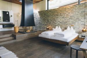 เตียงในห้องที่ Wiesergut