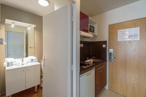 Koupelna v ubytování Appart’City Confort Paris Villejuif