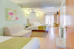 Postel nebo postele na pokoji v ubytování Hotel D. Dinis