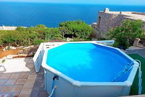 The swimming pool at or close to Villetta Azzurra