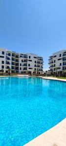 Bazén v ubytování Appartement costa mar martil nebo v jeho okolí