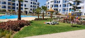 Bazén v ubytování Appartement costa mar martil nebo v jeho okolí