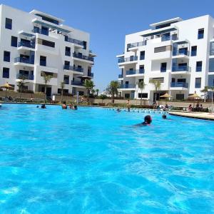 Bazén v ubytování Appartement costa mar martil nebo v jeho okolí